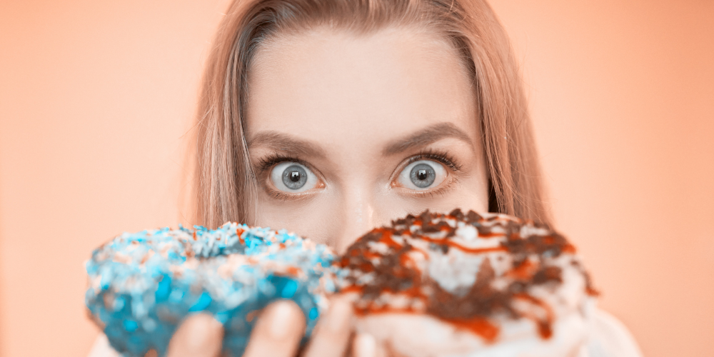 PICTURE OF A GIRL CRAVING DONUTS